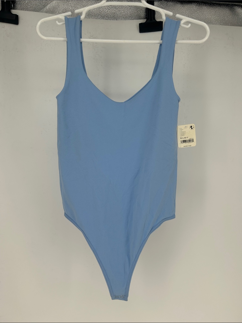 NWT Free People Intimately Clean Lines Bodysuit in Cerulean Denim Blue size M/L